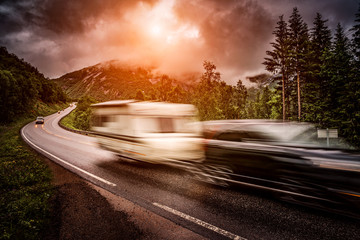 Caravan car travels on the highway.