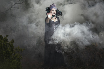 Gothic girl in the smoke.