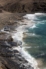 Rock coast near La Pared village on the south western part of Fuerteventura . Canary Islands, Spain