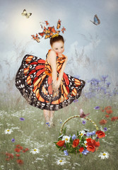 Little girl in a dress butterflies in a field of poppies and cornflowers