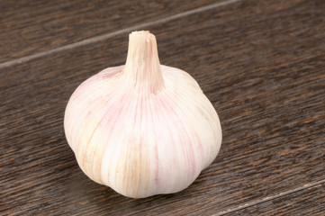 Garlic on wooden surface