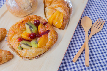 fruit pie on wood tray