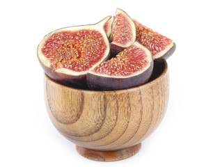 figs in wooden bowl isolated