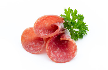 Salami smoked sausages slices isolated on white background.