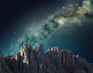 Poster milky way in the sky above the mountain ridge © Paulista