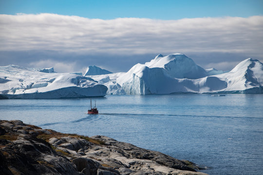 A boat and the icefjord in Ilulissat