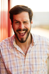 portrait of a man with headsets outside