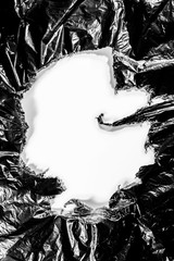 Round plastic black garbage bag background