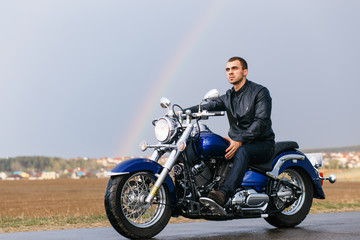 Obraz na płótnie Canvas Man riding a motorcycle