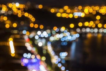 Blurred defocused lights of night city