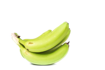 green bananas on white background