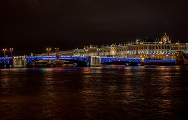 Fototapeta na wymiar Winter Palace and Palace Bridge at night