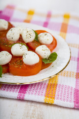 Caprese salad on a wooden table
