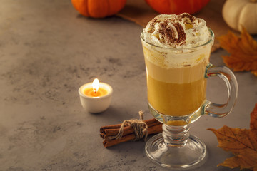 Pumpkin spice latte with whipped cream.