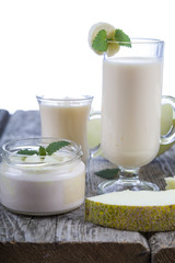 Obraz na płótnie Canvas Yogurt and smoothie with melon