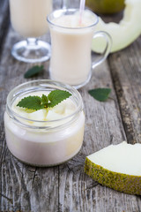 Obraz na płótnie Canvas Yogurt and smoothie with melon