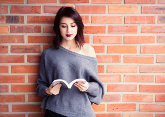 young caucasian woman with book