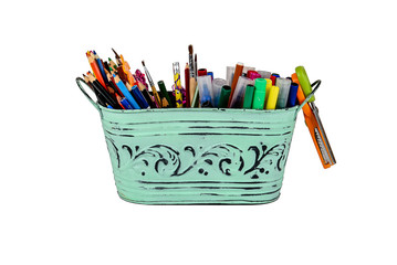 basket with stationery, pencils and pens.
