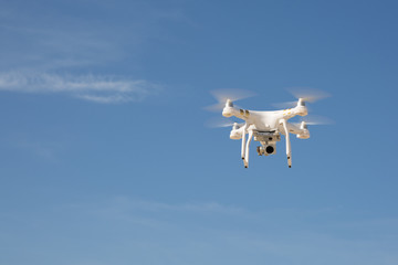 Image of a drone under blue sky