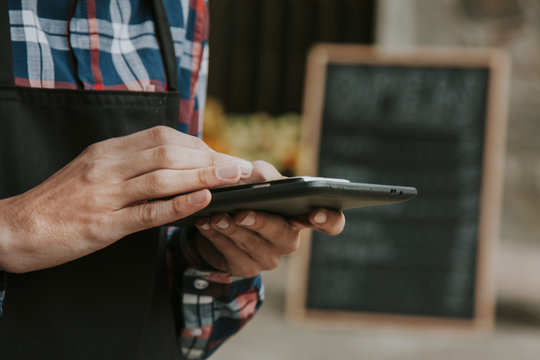 hand with mobile phone, shopping and stores