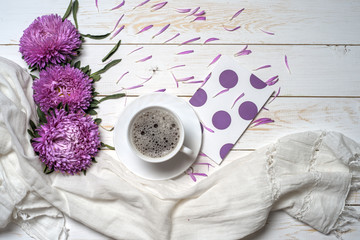 Word relax with cup of coffee and pink flowers