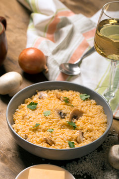 Risotto with mushrooms, fresh herbs and parmesan cheese