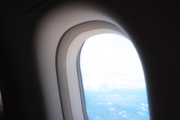 Clouds in the aircraft's porthole