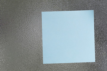 Fototapeta premium Blue of Note paper placed on glass floor.