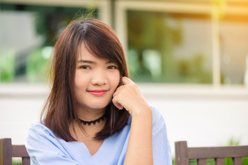 Portrait of a pretty happy woman, smiling