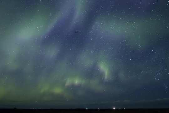 Aurora Borealis beautiful northern light in the clear night sky,  Iceland