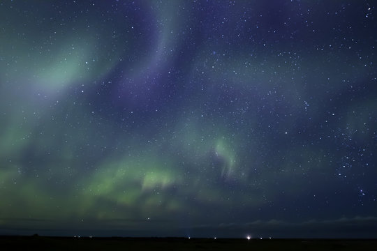 Aurora Borealis beautiful northern light in the clear night sky,  Iceland