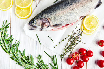 Raw trout, rosemary, tomatoes, lemon, thyme