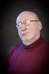 serious man with glasses