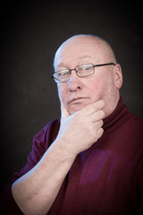 serious man with glasses