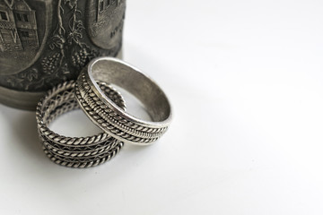 Engraved Metal Cup with Wedding Rings
Wedding Rings and engraved metal cup
