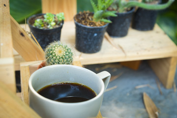 black coffee with cactus