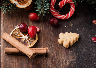 Christmas shortbread cookies in sledge with candies and decorati