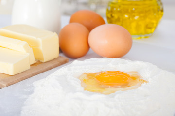 Ingredients for baking cakes: flour, eggs and sugar
