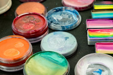 Paints on dark background