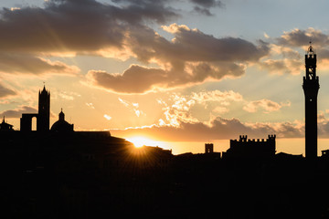 Silhouette of Siena at sunset - obrazy, fototapety, plakaty