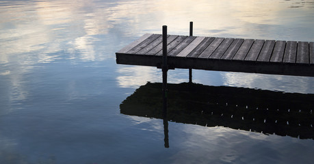 Dock and Shadow on a Lake
