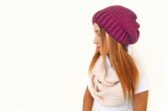 greek model advertises crochet scarf and beanie