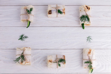 Tortilla wraps with cottage cheese, dill and cucumber