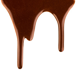 streams of milk chocolate on white background