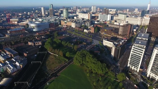 Aerial view of a park and Birmingham city centre, UK.