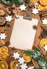 Fototapeta na wymiar Christmas cookies and spices. Holidays food. Recipe book