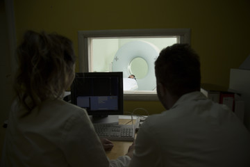 scientist Scanning the brains of patients with a Ct scan