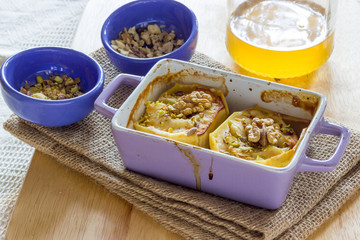 Baked apple with honey and pistachio nuts