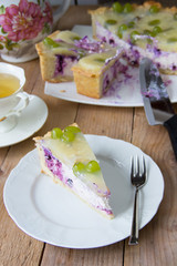 Homemade cheesecake with blueberries, pineapple, grapes and jelly. Russian quark cake