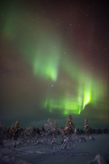 Fototapeta na wymiar Northern Lights in Lapland, Finland.